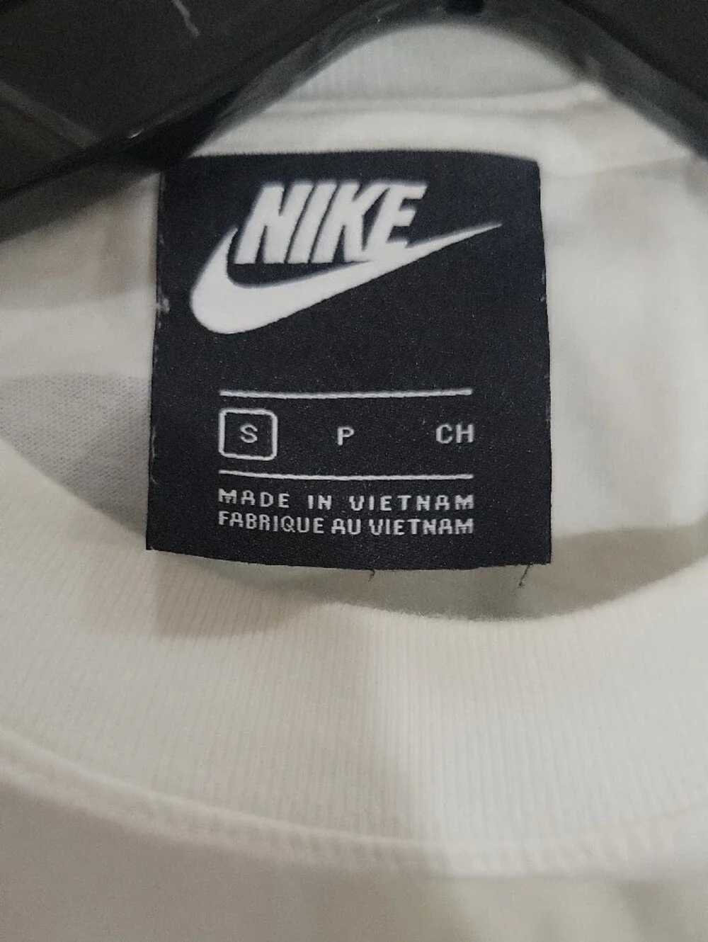 Nike White Tee with Pink Logo and Pastel Graphic